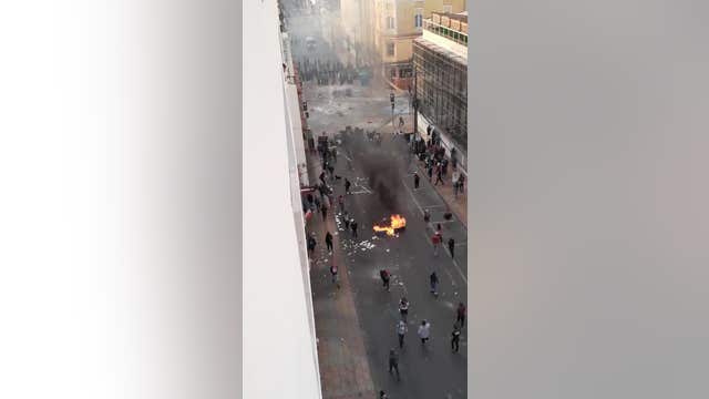 Speeding car slams into protesters in Chile