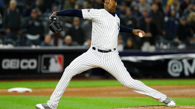 Chapman, Yankees agree to $48M, 3-year contract