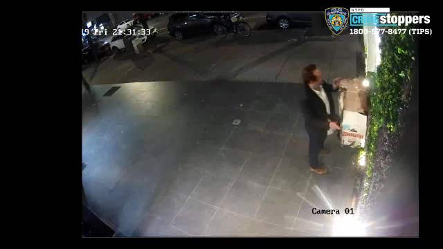 Man sets boxes outside Manhattan building on fire
