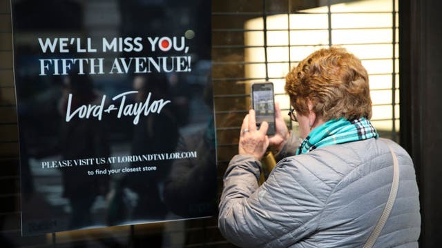 Empty stores along 5th Avenue decorated for holidays