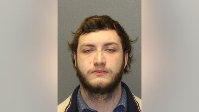 Bank teller accused of attacking customer in home invasion