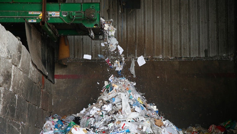 After being sorted, material to be taken to a landfill is piled up at the Green Waste material recovery facility on Thursday, March 28, 2019, in San Jose, Calif.