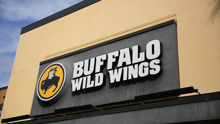A generic photo of a sign above a Buffalo Wild Wings restaurant