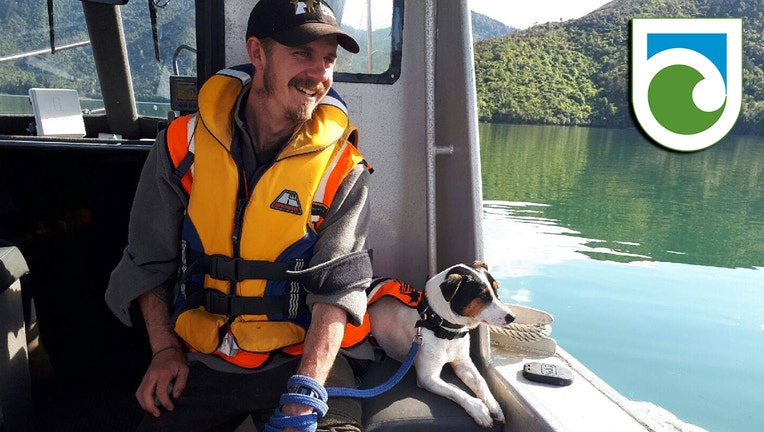 Dog and handler on a boat