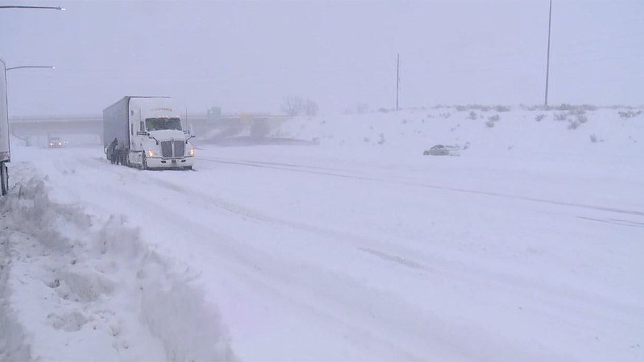 Snow covering a highway in Denver