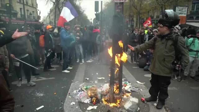 Strikes and fiery protests close Eiffel Tower, shut transit in Paris