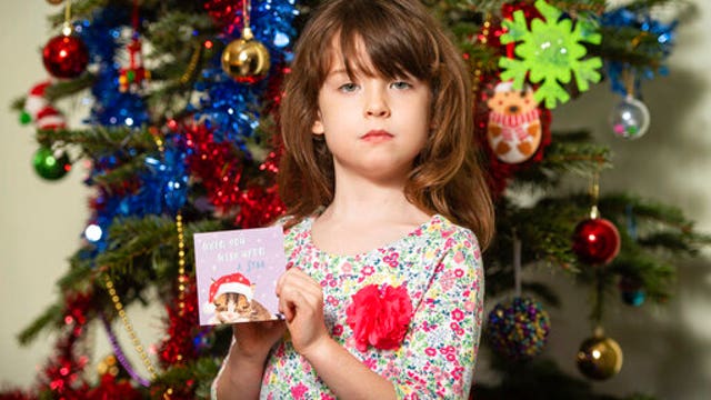 Girl finds note in Christmas cards from Chinese factory worker pleading for help