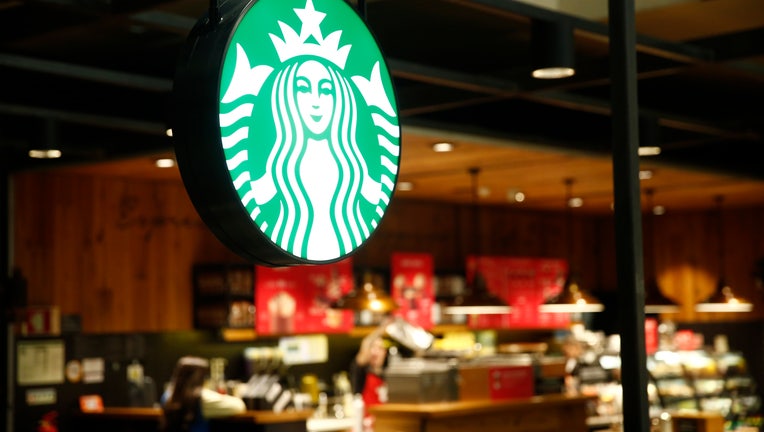 LISBON PORTELA AIRPORT, LISBON, PORTUGAL - 2019/12/11: Starbucks coffee restaurant logo seen at Lisbon Portela Airport. (Photo by Sergei Mikhailichenko/SOPA Images/LightRocket via Getty Images)