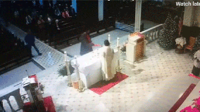 Man pours juice on church altar during Mass