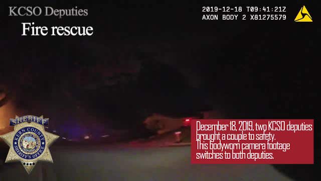 Officers help elderly couple to safety as fire ravages California home