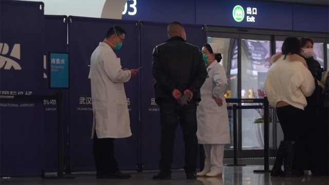 City in China stops outbound flights, trains to fight virus