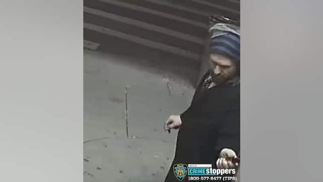 Police hunt for 2 men seen drawing swastikas