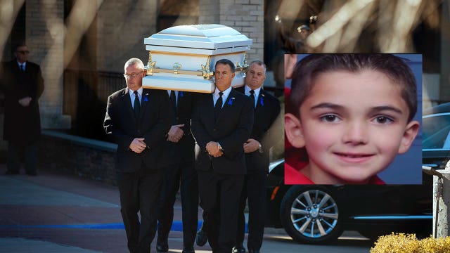 Funeral held for boy who died in freezing garage
