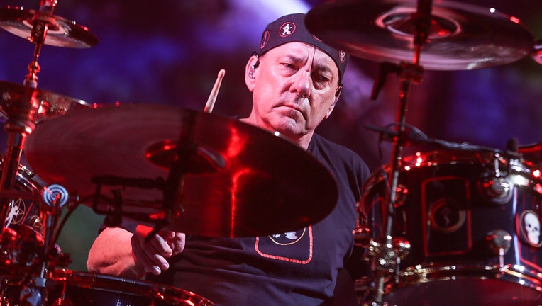 Drummer Neil Peart of Rush behind his drum kit