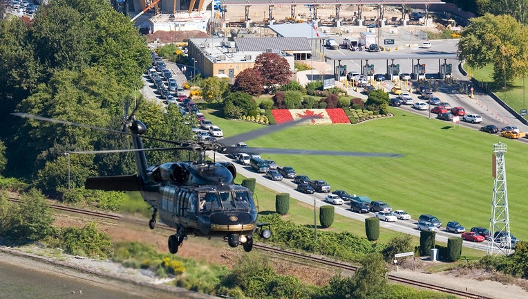 CBP helicopter flies near the border