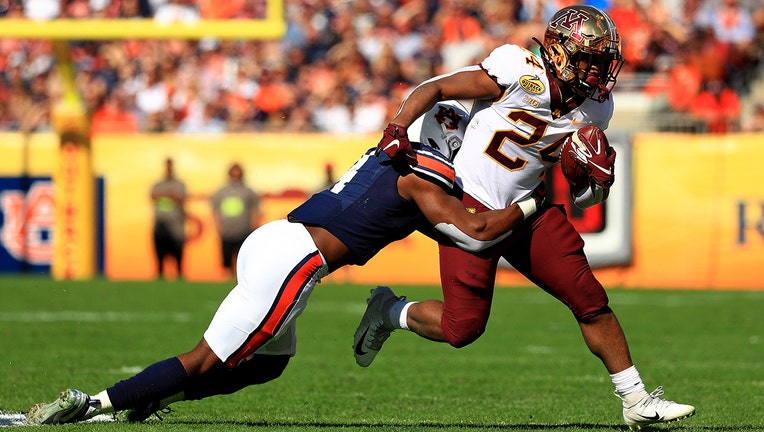 TAMPA, FLORIDA - JANUARY 01: Mohamed Ibrahim #24 of the Minnesota Golden Gophers rushes during the 2020 Outback Bowl against the Auburn Tigers at Raymond James Stadium on January 01, 2020 in Tampa, Florida. (Photo by Mike Ehrmann/Getty Images)