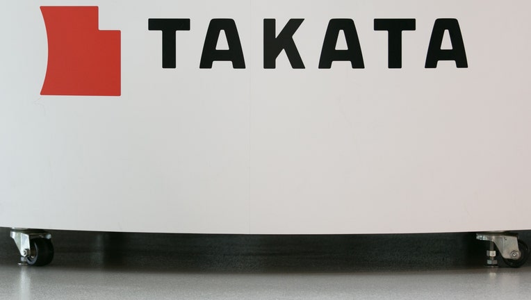 A Takata Corp. logo is seen on display at a car showroom in Tokyo, Japan.