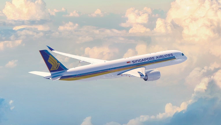 A Singapore Airlines Airbus A350-900XWB jetliner in flight