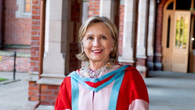 Hillary Clinton wearing ceremonial robes at Queen's University