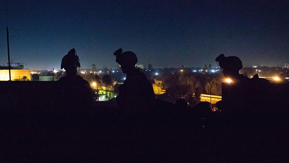 Marines guard the U.S. Embassy in Iraq