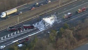 Fire destroys bus on NJ highway