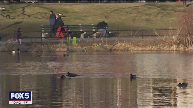 New Yorkers enjoying unseasonably warm winter