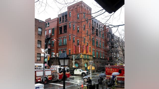 Conservators work on items damaged in Chinatown museum fire
