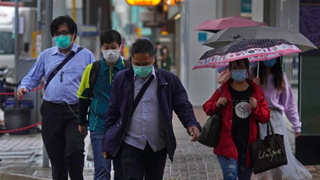 New virus cases fall; WHO says China bought the world time