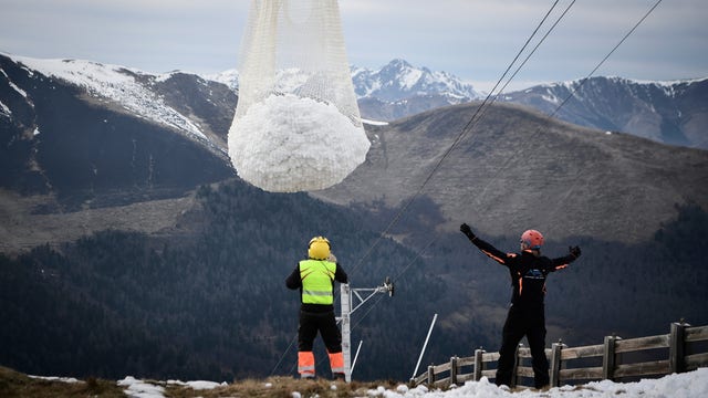 Ski resort in France uses helicopters to deliver snow, angering environmental groups