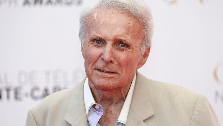 US actor Robert Conrad poses during the closing ceremony of the 53rd Monte-Carlo Television Festival on June 13, 2013 in Monaco. AFP PHOTO / VALERY HACHE (Photo credit should read VALERY HACHE/AFP via Getty Images)