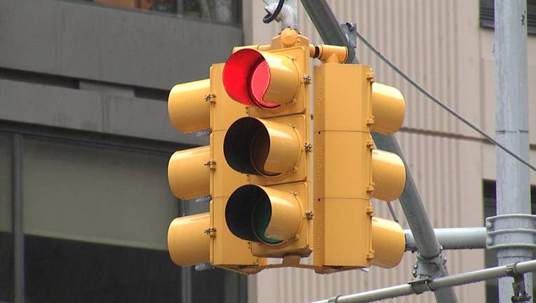 A New York City traffic light shining red