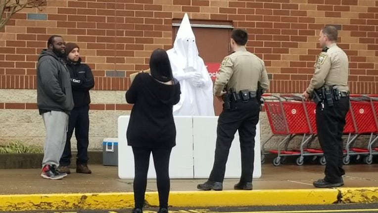 Man in KKK outfit