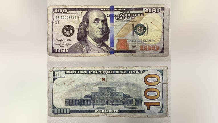 A motion picture prop $100 bill.