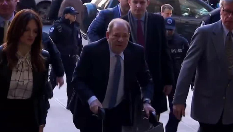 Harvey Weinstein uses a walker to arrive in court