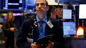 Stocks sink, bond yields take another breathtaking drop