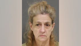 Officials: NJ woman used tape dispenser, shower rod to kill man