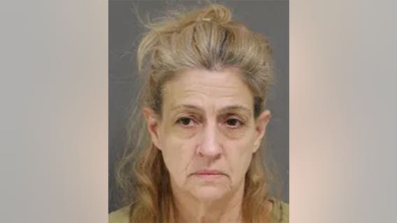 Officials: NJ woman used tape dispenser, shower rod to kill man