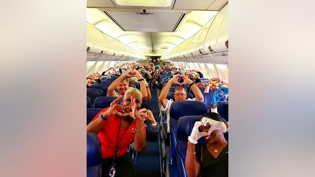 Photo of health care workers flying to help NYC gets love