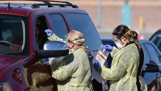 Chaos, inconsistency mark launch of drive-thru virus testing