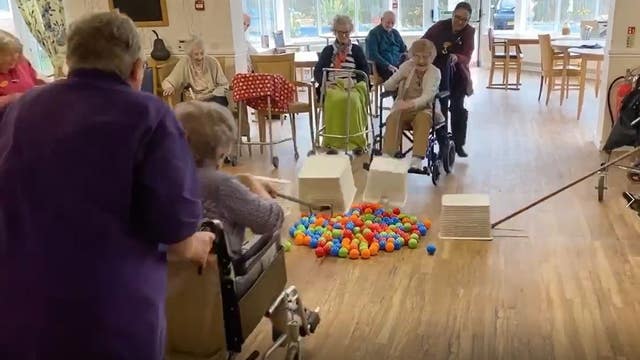 Seniors play life-size Hungry Hungry Hippos at British nursing home