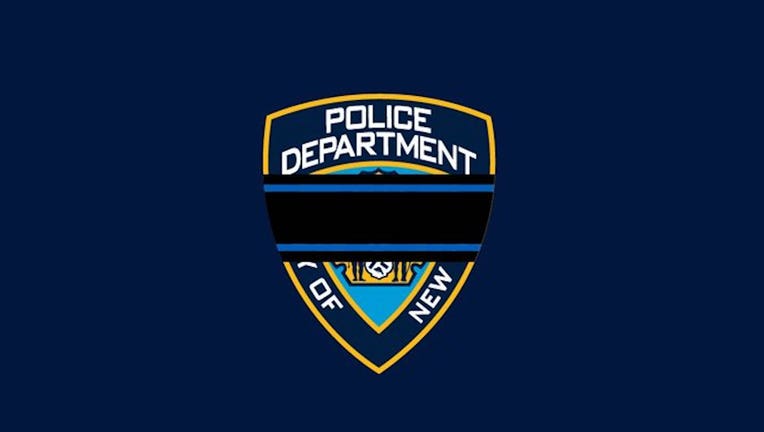 Black band across NYPD shield logo