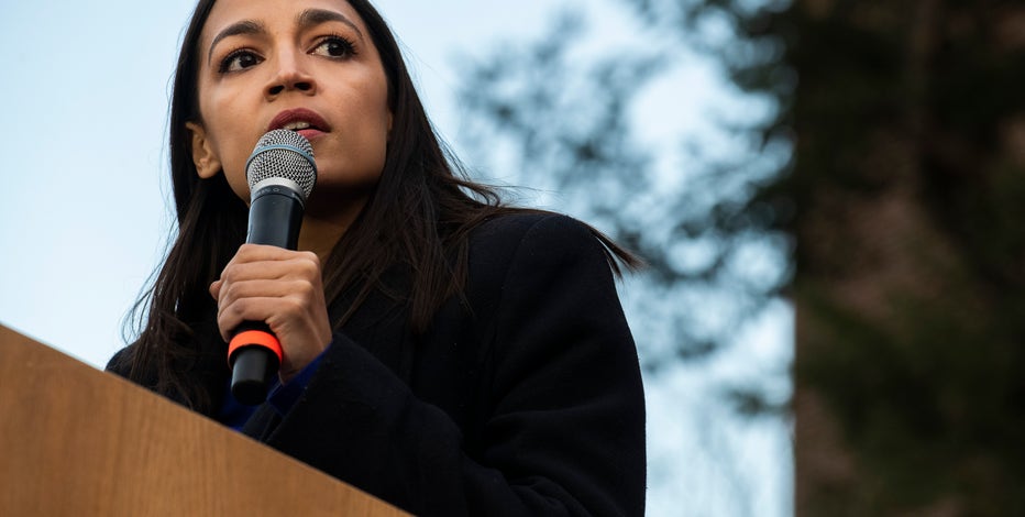 Ocasio Cortez battles accusations of losing touch with Queens district