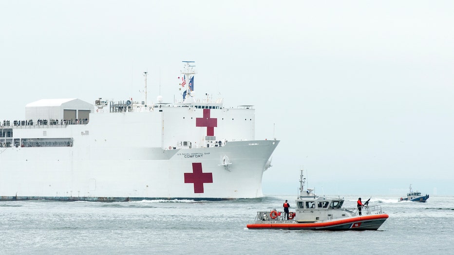 Navy hospital ship, police boat and Coast Guard boat
