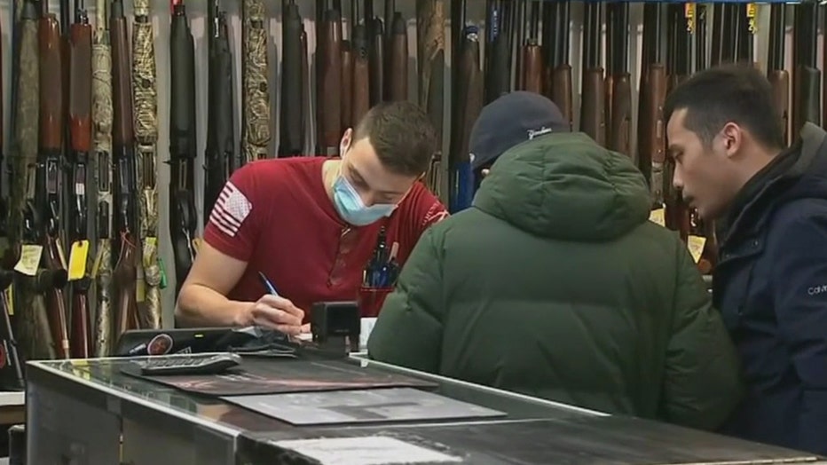 Shoppers at a gun store