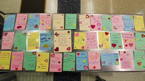 TSA officers make cards for COVID-19 patients and hospital workers