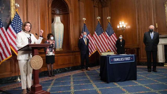 Somber Congress delivers nearly $500B more in virus aid