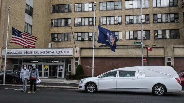 US COVID-19 deaths climb past 60,000, according to Johns Hopkins data