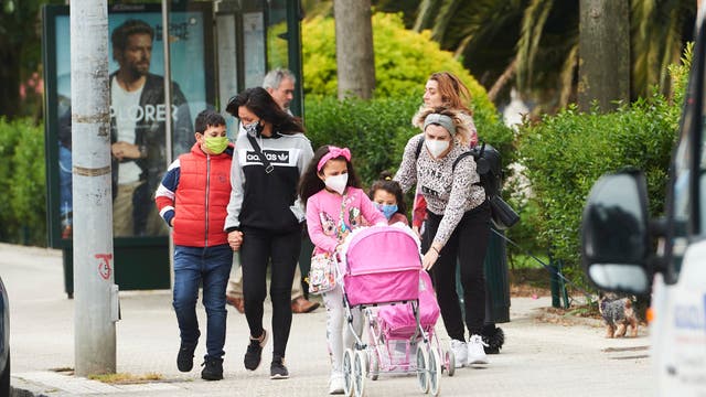Kids in Spain relish outdoor hour as virus lockdowns ease