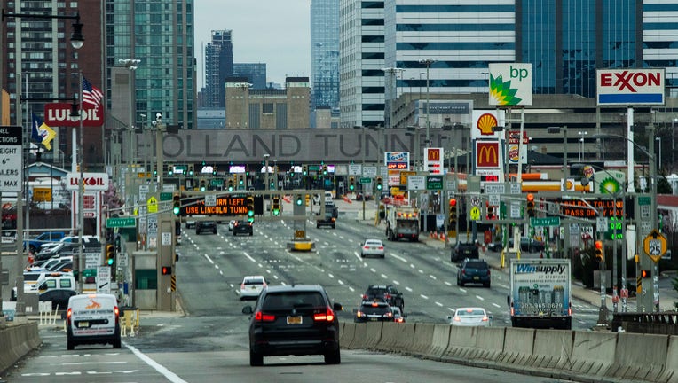 New York bound Holland Tunnel closed overnight for Sandy repairs