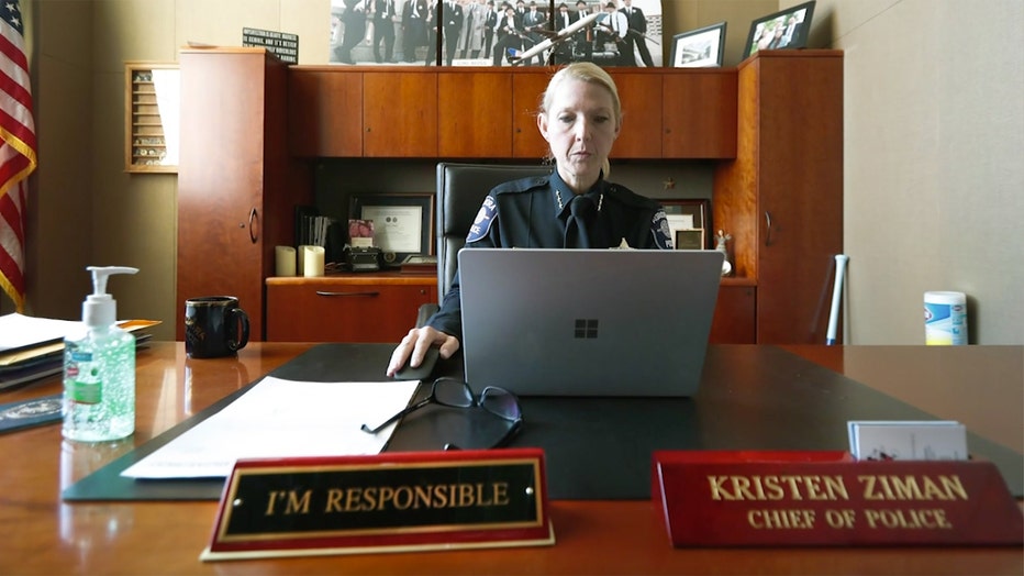 Police chief at her desk